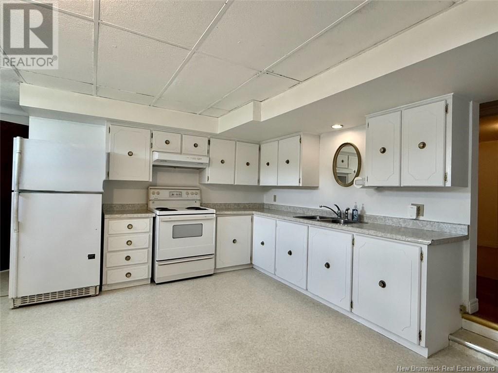 25 Arseneault Street, Balmoral, NB - Indoor Photo Showing Kitchen With Double Sink