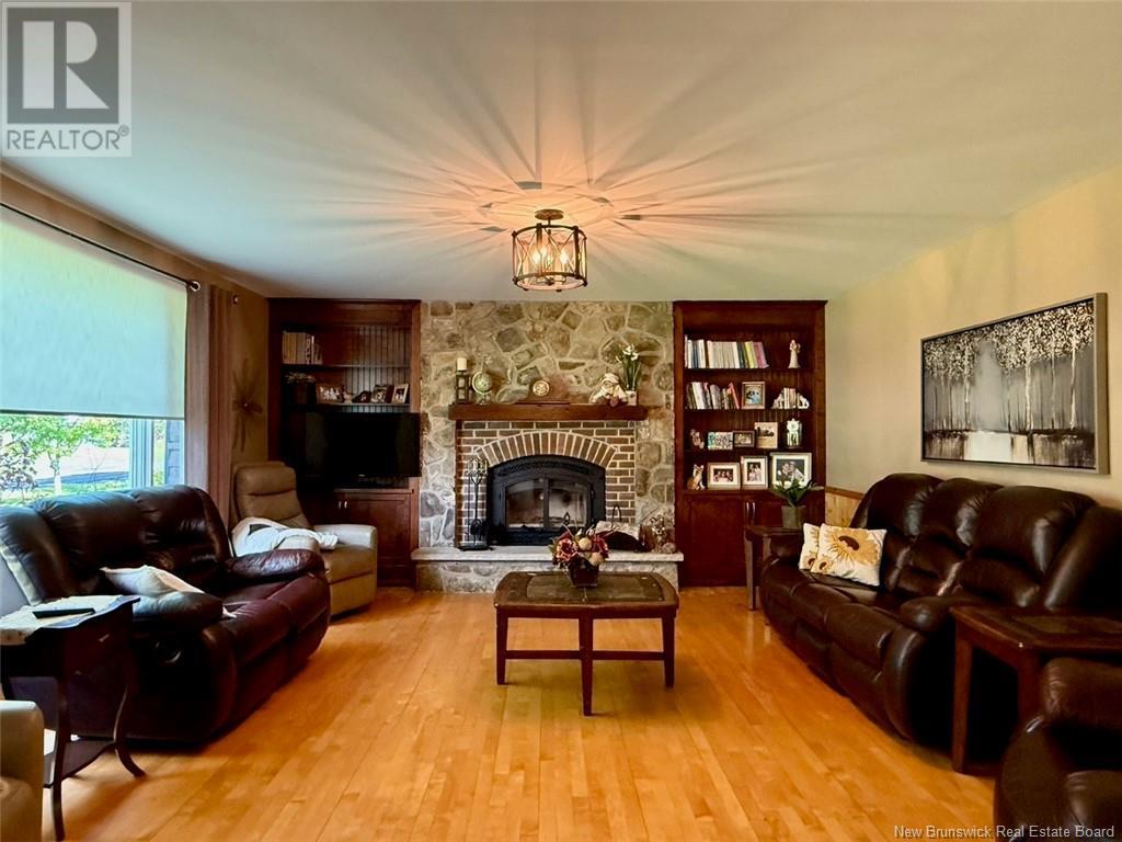 25 Arseneault Street, Balmoral, NB - Indoor Photo Showing Living Room With Fireplace