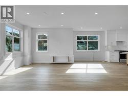 Large living room with ample natural light -