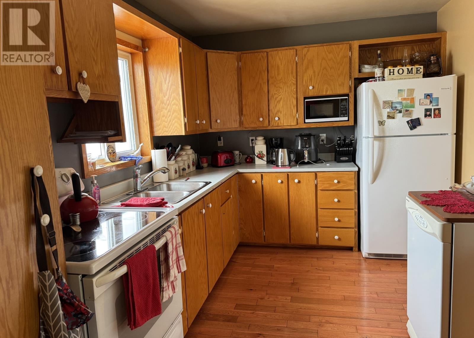 13 Southside Road, Boyd'S Cove, NL - Indoor Photo Showing Kitchen With Double Sink