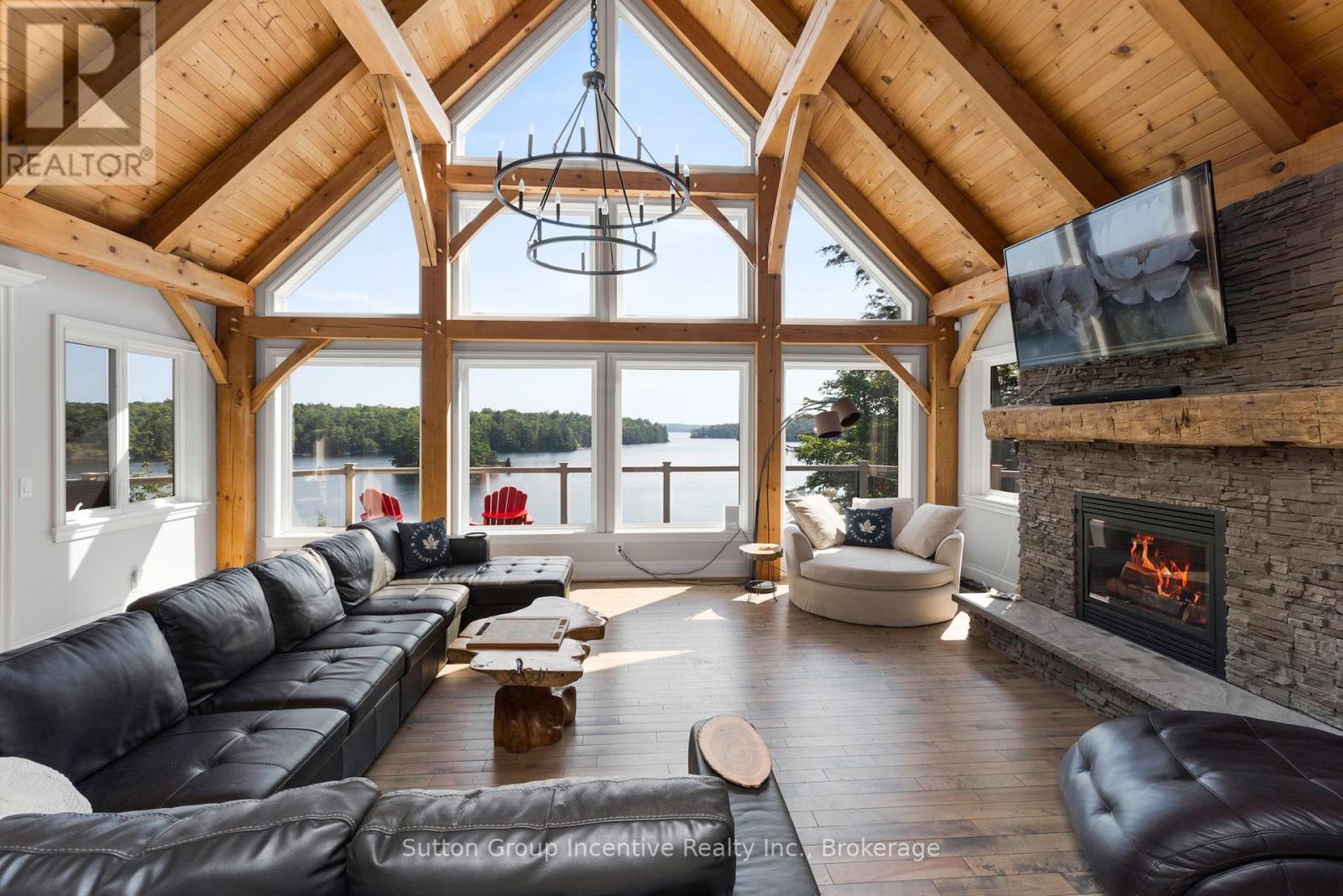 15 Gordon Point Lane, Seguin, ON - Indoor Photo Showing Living Room With Fireplace