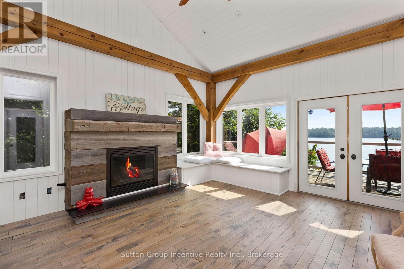 15 Gordon Point Lane, Seguin, ON - Indoor Photo Showing Other Room With Fireplace