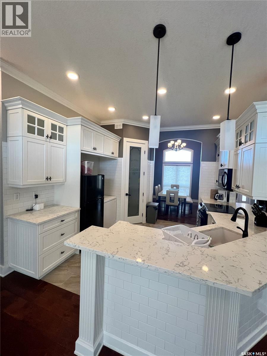 Natalie Acres, Waldeck, SK - Indoor Photo Showing Kitchen With Double Sink