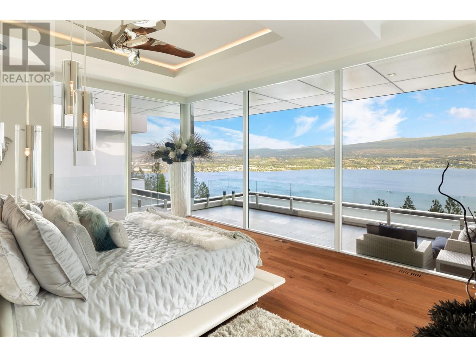 2469 Thacker Drive, West Kelowna, BC - Indoor Photo Showing Bedroom With Body Of Water