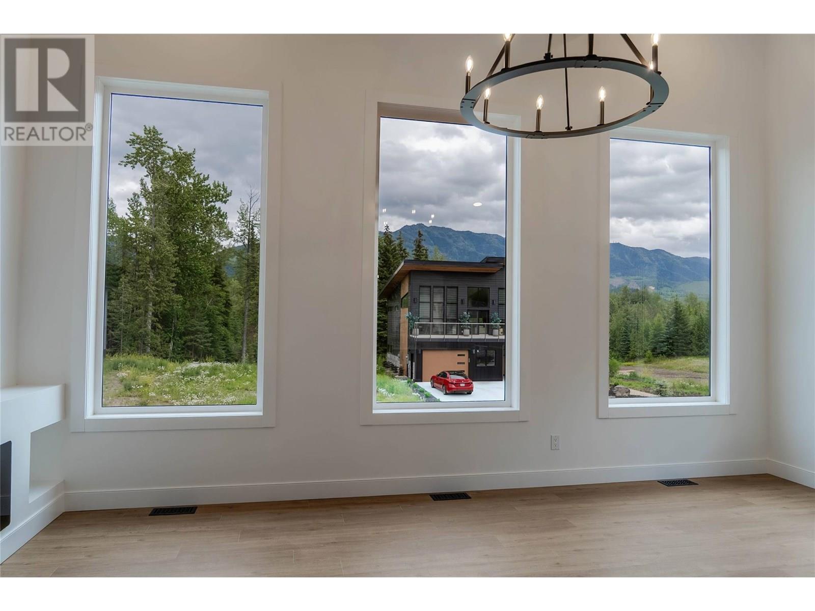 2 Huckleberry Place, Fernie, BC - Indoor Photo Showing Other Room With Fireplace
