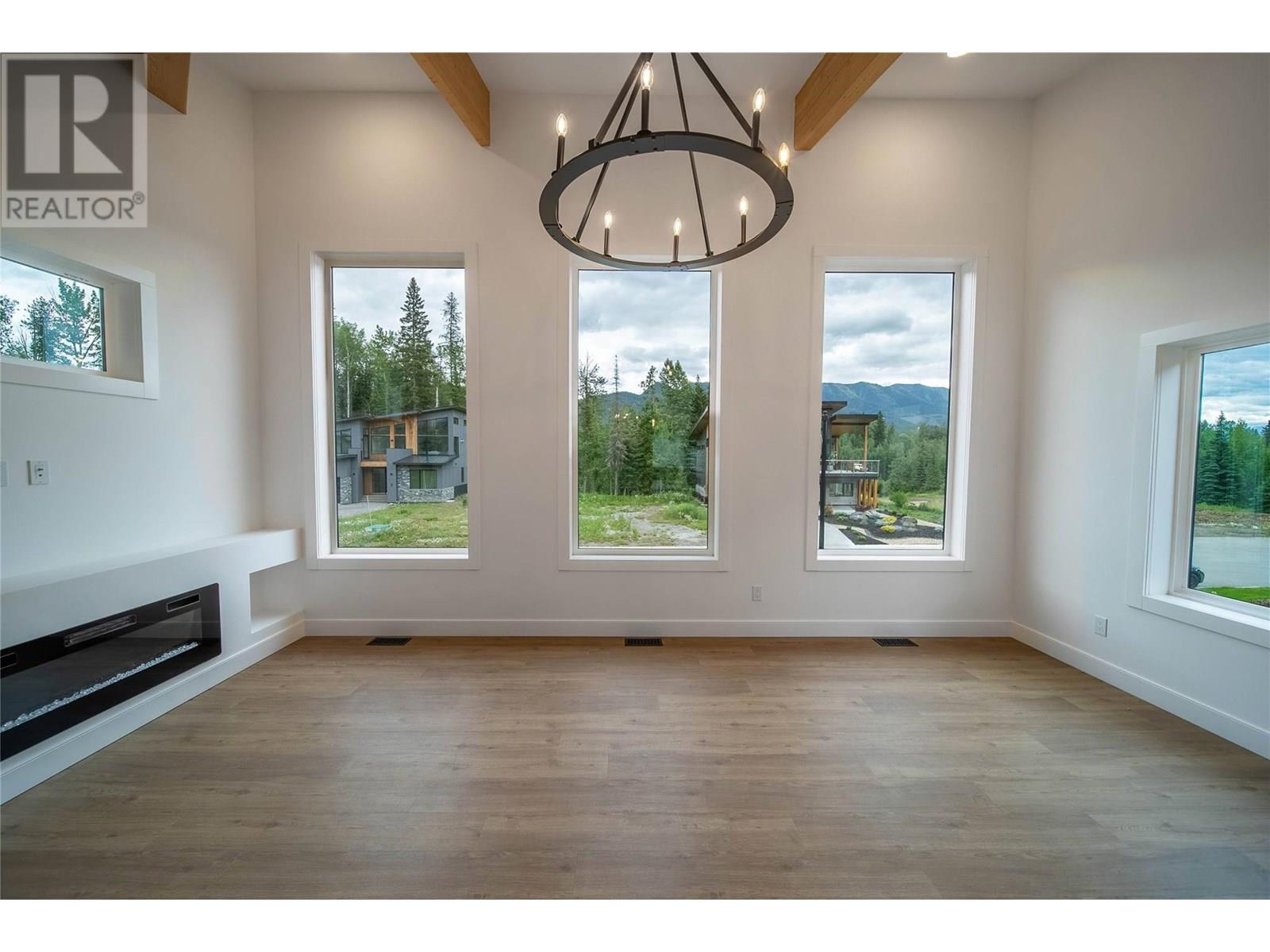 2 Huckleberry Place, Fernie, BC - Indoor Photo Showing Other Room With Fireplace