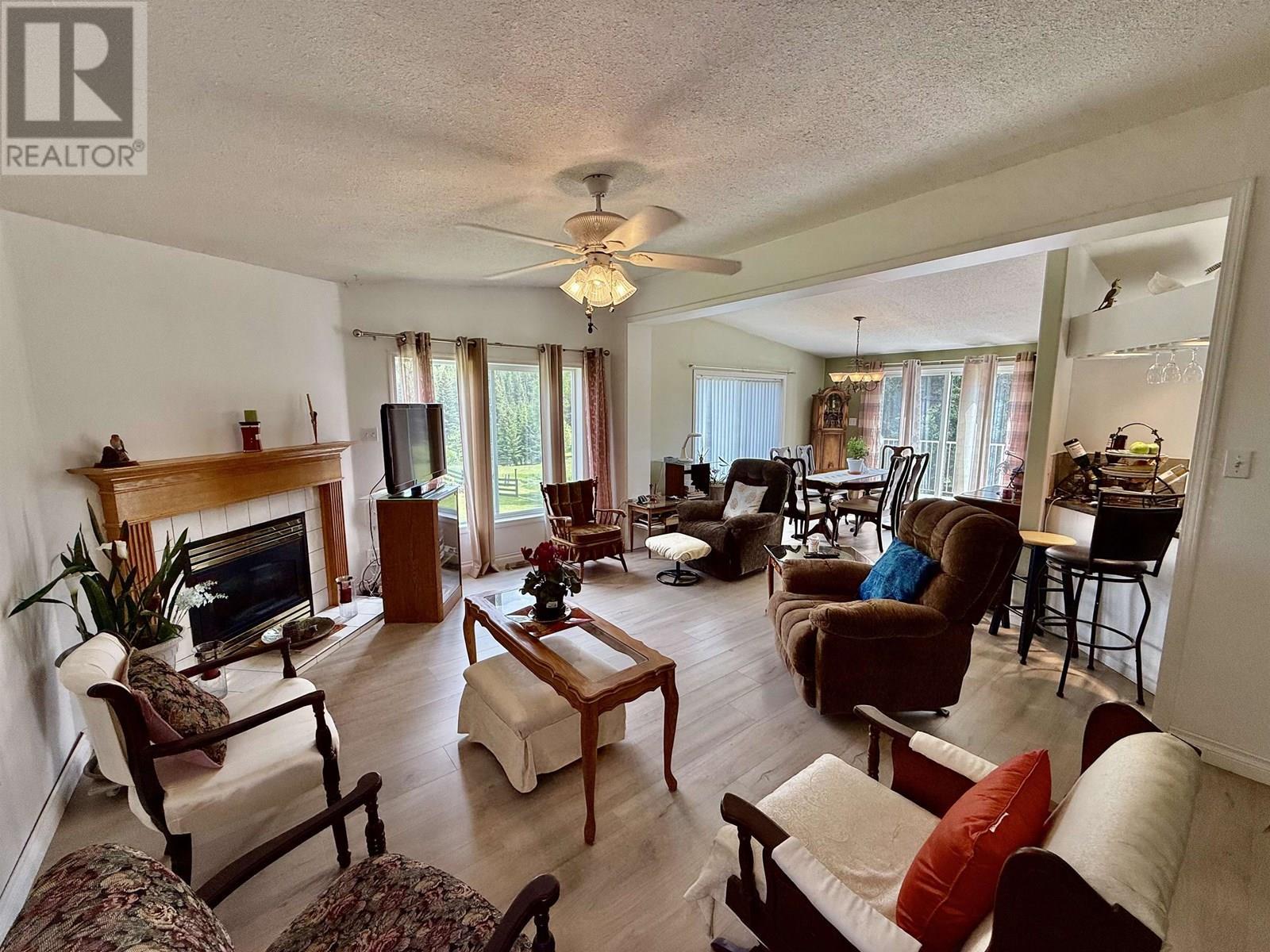5307 Canim Hendrix Lake Road, 100 Mile House, BC - Indoor Photo Showing Living Room With Fireplace
