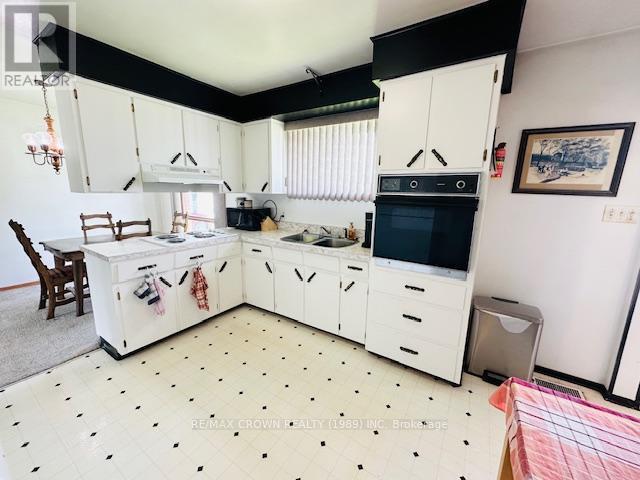12 Winnipeg Street, Kapuskasing, ON - Indoor Photo Showing Kitchen With Double Sink
