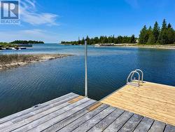 Offering waterfront for safe boat docking. -