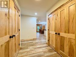 Back to centre hall w/ large pantry storage. -