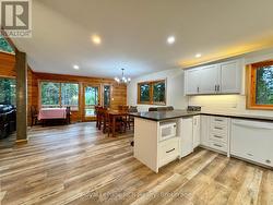 Looking into open concept dining room & kitchen. -