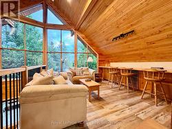 Second level sitting room with built-in deck. -