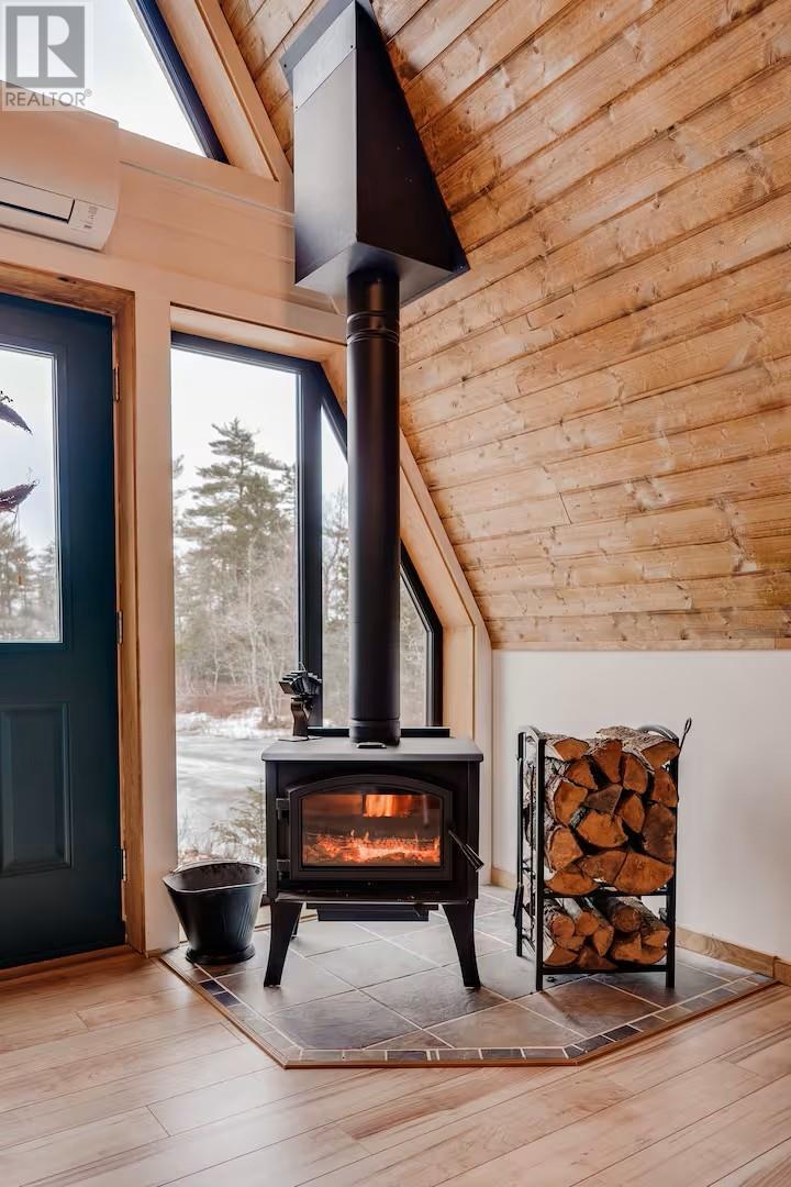 40 Ocean View Drive, Norman'S Cove, NL - Indoor Photo Showing Other Room With Fireplace