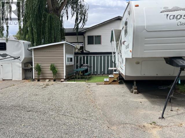 RV with queen bed and open dining have (does not have to move) - 5901 Main Street Unit# 15, Osoyoos, BC