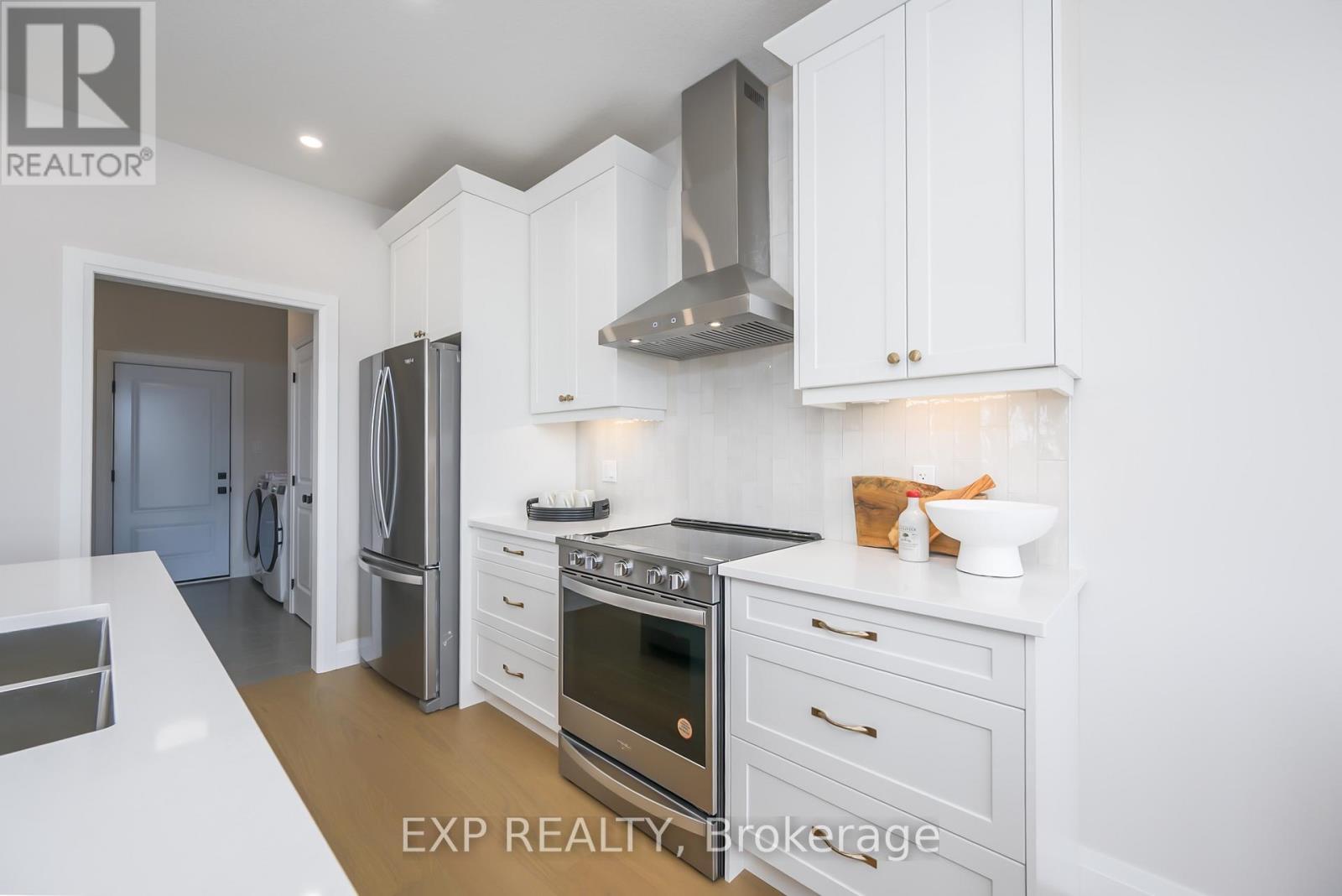 76 Dearing Drive, South Huron (Stephen), ON - Indoor Photo Showing Kitchen With Double Sink With Upgraded Kitchen