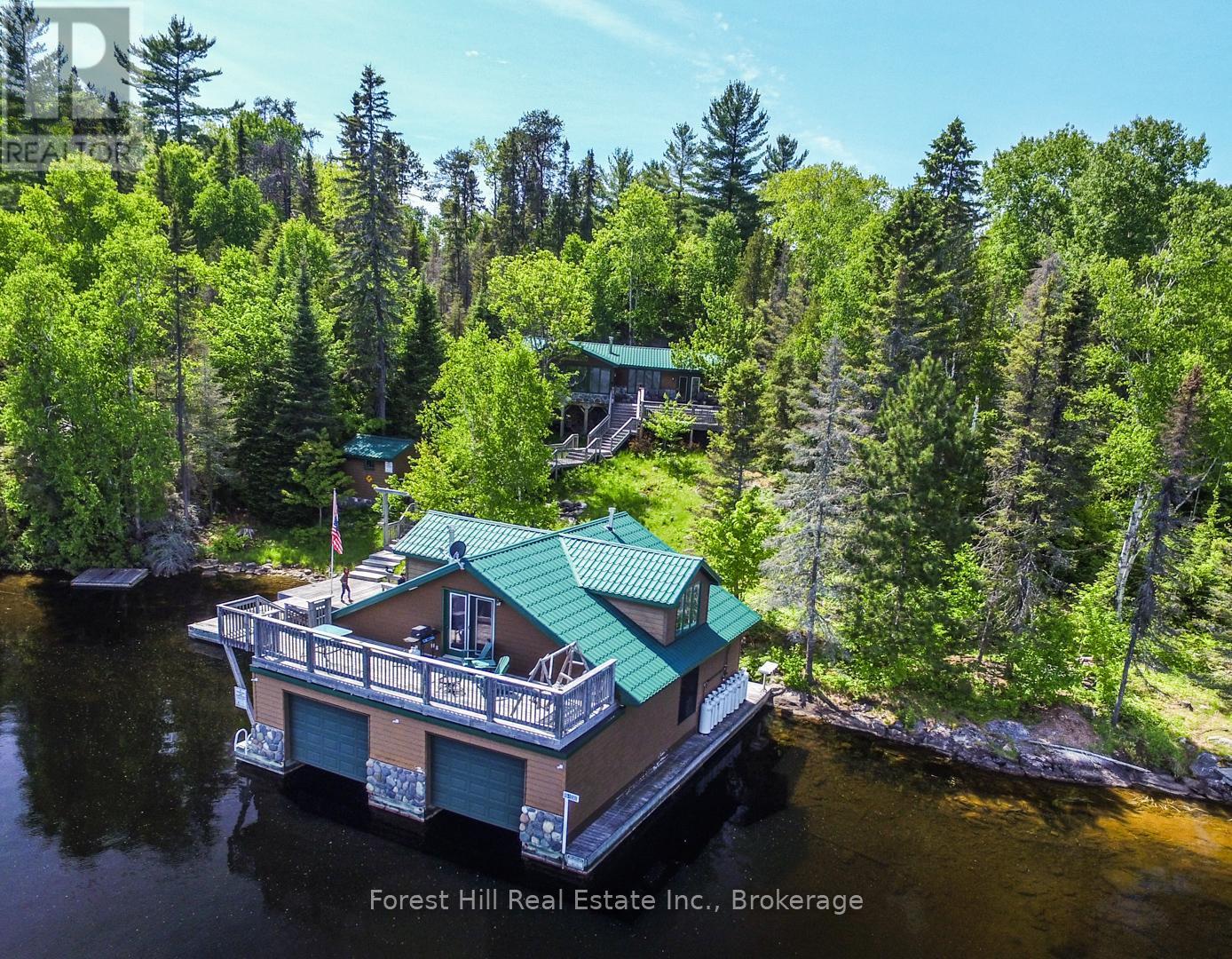 Aerial view with boathouse and suite - 10365 Rabbit, Temagami, ON - Outdoor With Body Of Water With Deck Patio Veranda