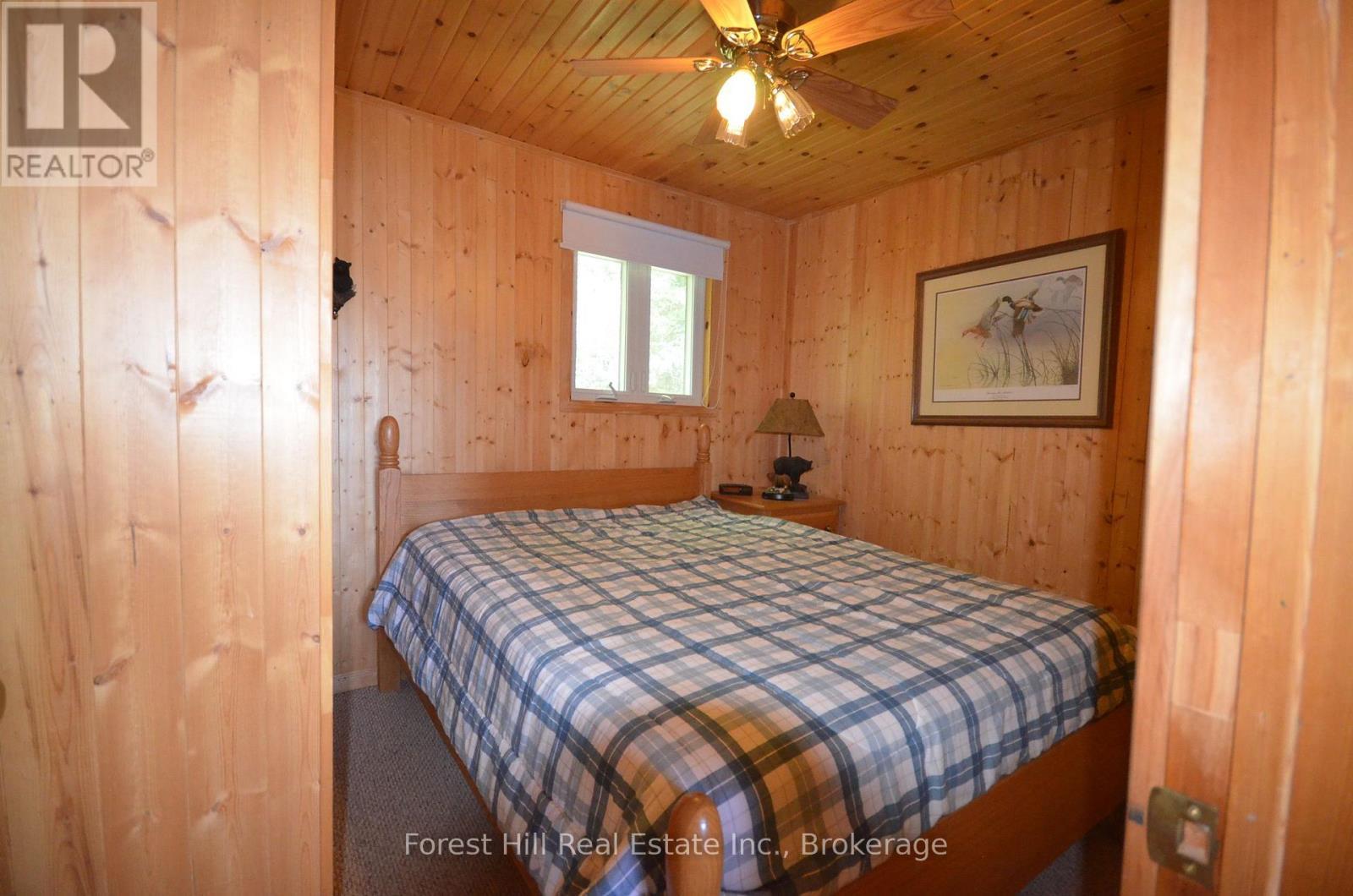 Mainhouse bedroom - 10365 Rabbit, Temagami, ON - Indoor Photo Showing Bedroom