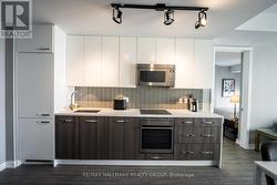 Kitchen w/Quartz counters and European Appliances -