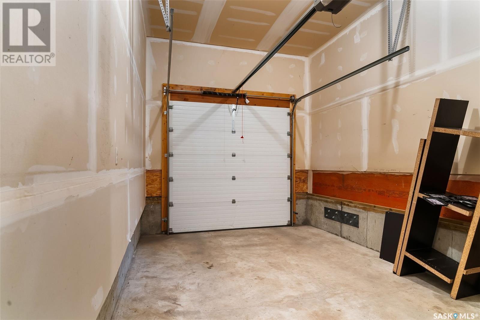 183 Chateau Crescent, Pilot Butte, SK - Indoor Photo Showing Garage