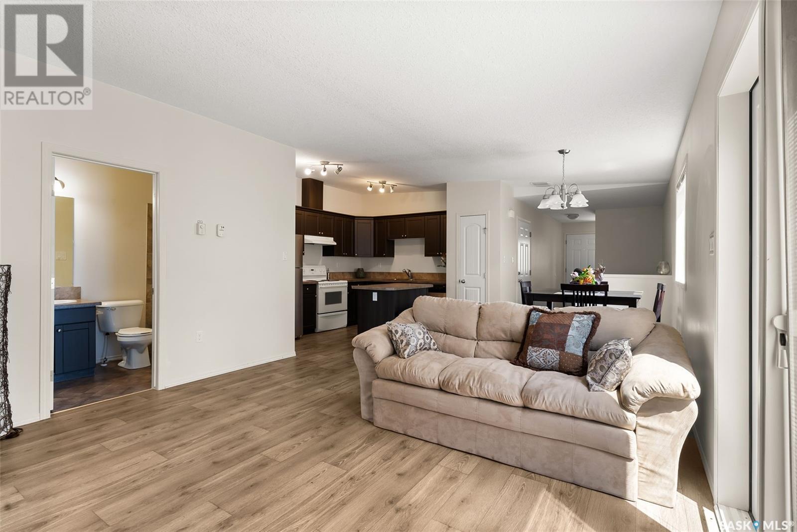 183 Chateau Crescent, Pilot Butte, SK - Indoor Photo Showing Living Room