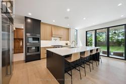 Wolf Six-Burner Gas Cooktop and Double Wall Ovens -