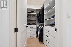 Dual Primary Walk-In Closets -