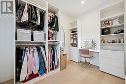 Large Walk-In Closet with Vanity to Third Bedroom -