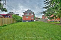 Backyard facing rear of house -