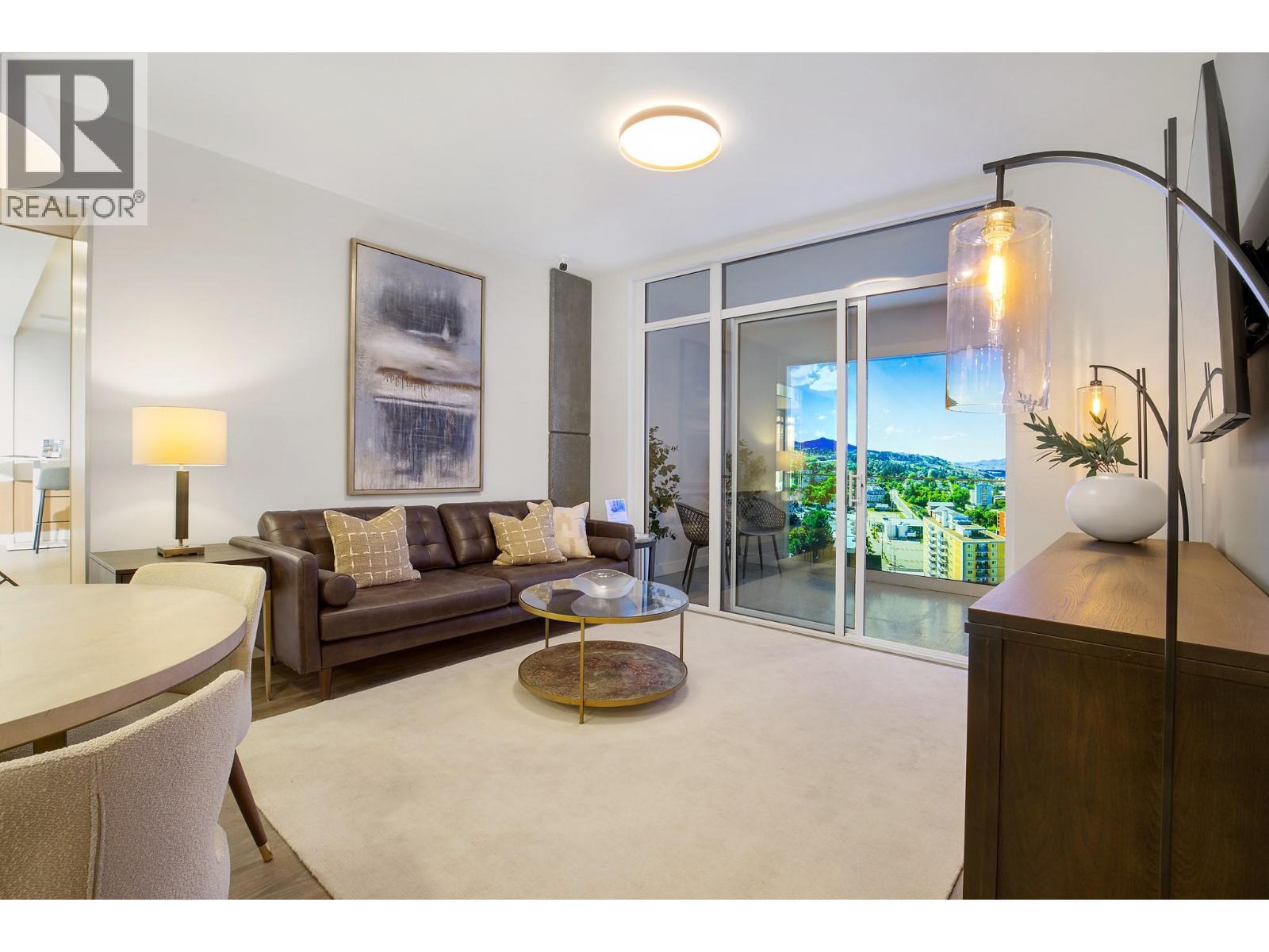 Photos are from our show suite, open daily 11-3 at 238 4th Avenue in Downtown Kamloops. Finishing, colours and room sizes are approximate and subject to change depending on unit. - 460 Nicola Street Unit# 506, Kamloops, BC - Indoor Photo Showing Living Room