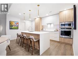 Photos are from our show suite, open daily 11-3 at 238 4th Avenue in Downtown Kamloops. Finishing, colours and room sizes are approximate and subject to change depending on unit. -