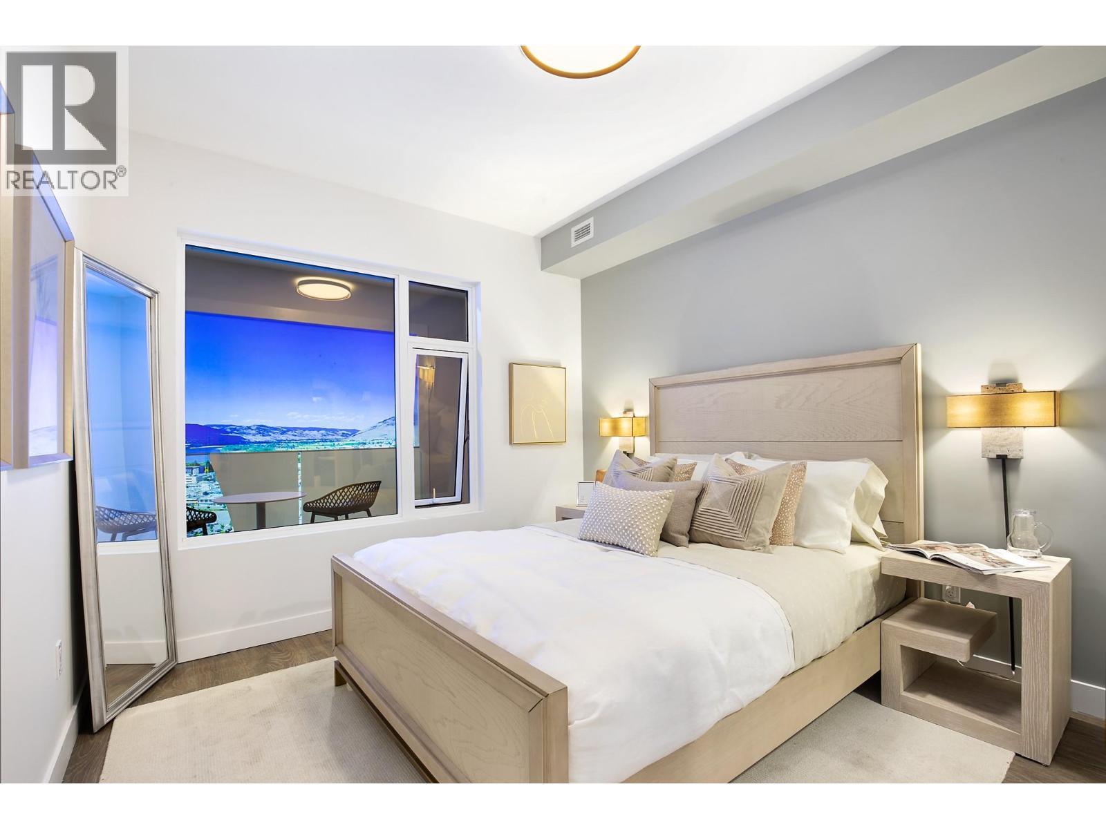 Photos are from our show suite, open daily 11-3 at 238 4th Avenue in Downtown Kamloops. Finishing, colours and room sizes are approximate and subject to change depending on unit. - 460 Nicola Street Unit# 506, Kamloops, BC - Indoor Photo Showing Bedroom