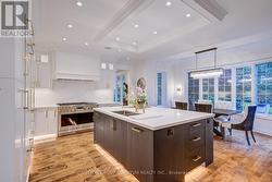 Island with Custom recessed Lighting -