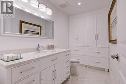 2pc Guest Bathroom in Lower Level w custom storage -
