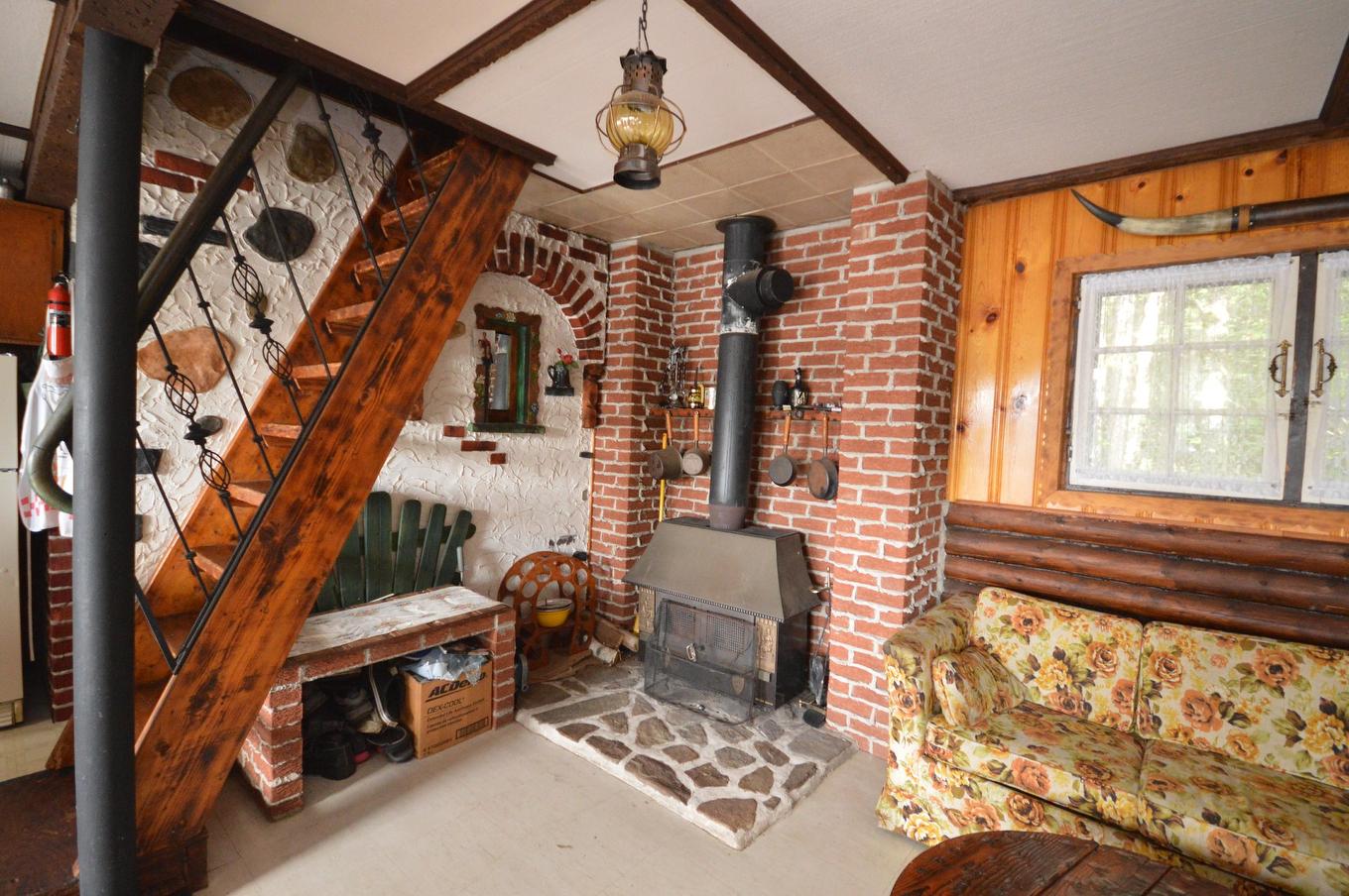 Living room - 11049 Ch. Chadrofer, Labelle, QC - Indoor Photo Showing Other Room With Fireplace