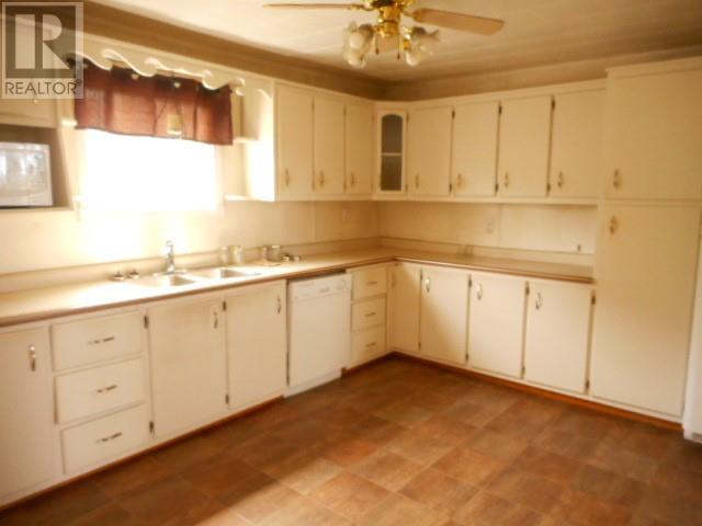 20 Main Street, Springdale, NL - Indoor Photo Showing Kitchen With Double Sink