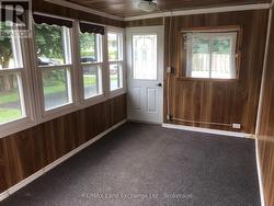 Main Entrance Via Sunroom -