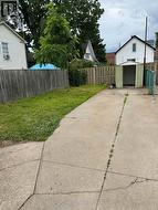 REAR PARKING AREA BEHIND HOUSE-MUTUAL DRIVEWAY -