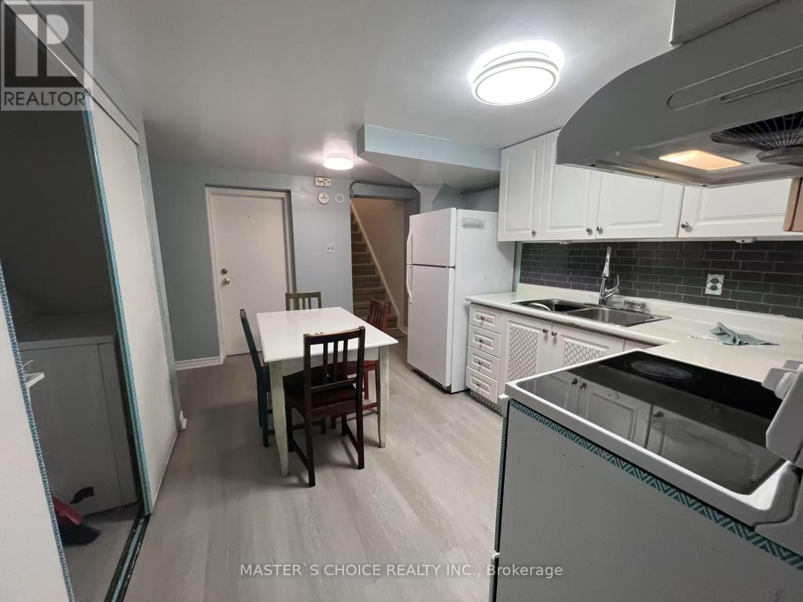 Bsmt - 16 Farmington Crescent W, Toronto, ON - Indoor Photo Showing Kitchen With Double Sink