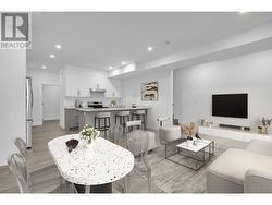 Virtually Staged Image - Dining/Living & Kitchen Area -