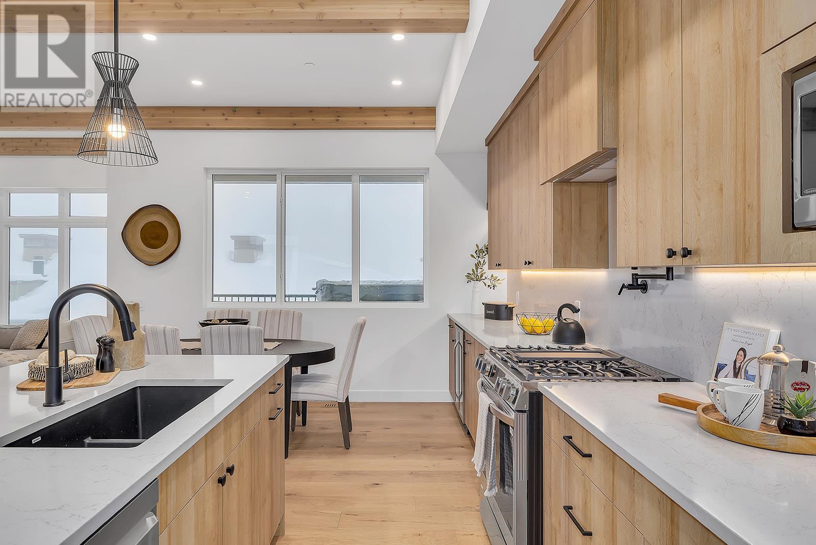 255 Feathertop Way Unit# 82, Big White, BC - Indoor Photo Showing Kitchen With Double Sink With Upgraded Kitchen