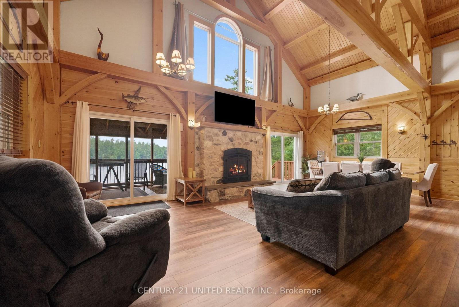1244 Marshall Lane, Frontenac (Frontenac North), ON - Indoor Photo Showing Living Room With Fireplace