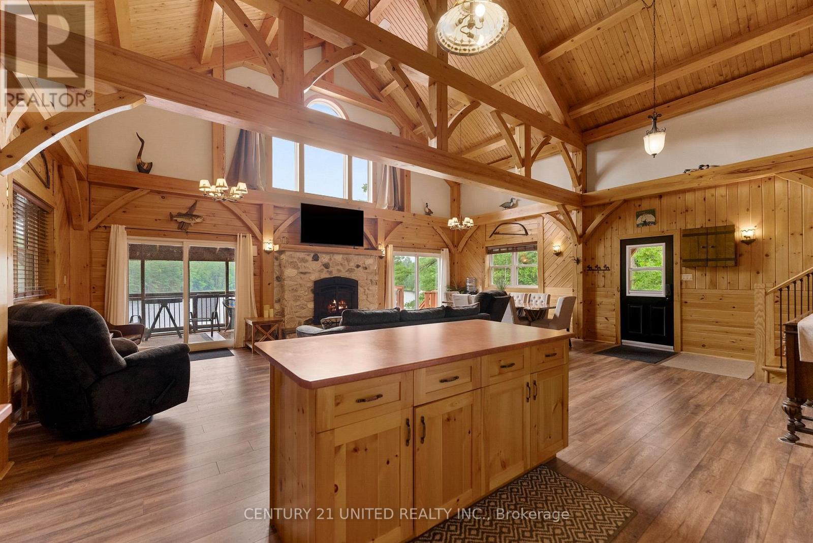1244 Marshall Lane, Frontenac (Frontenac North), ON - Indoor Photo Showing Other Room With Fireplace