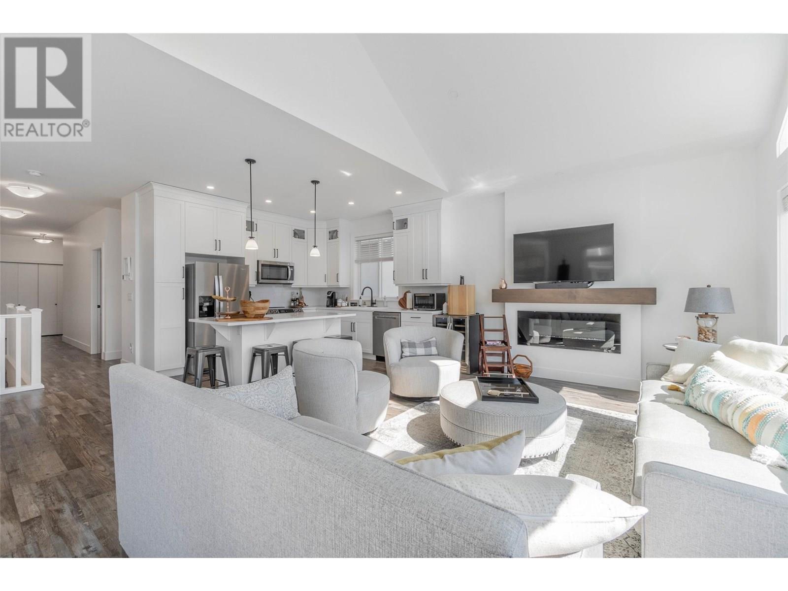 2450 Radio Tower Road Unit# 252, Oliver, BC - Indoor Photo Showing Living Room With Fireplace