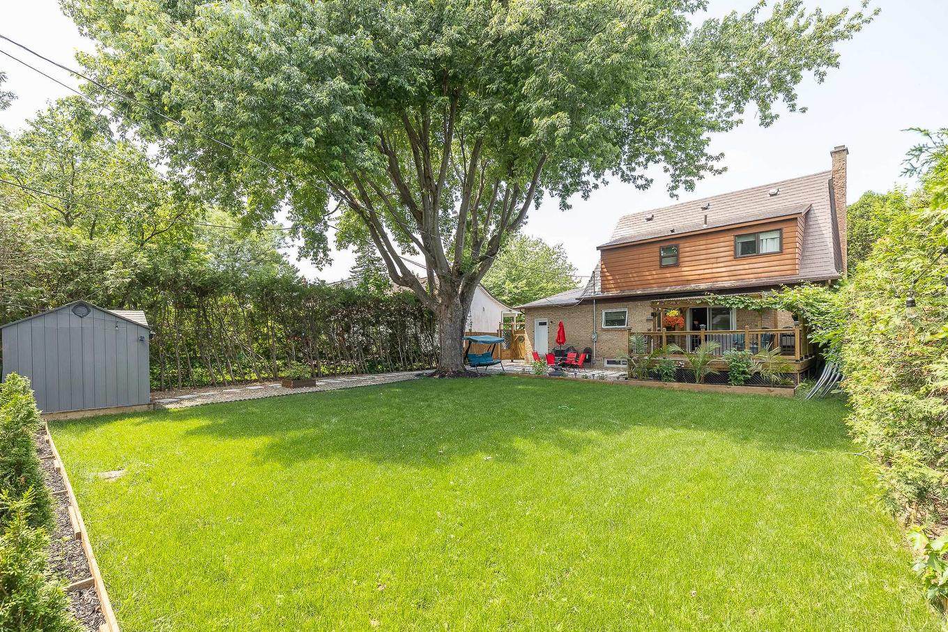 Face arrière - 316 Rue Ladouceur, Montréal (L'Île-Bizard/Sainte-Geneviève), QC - Outdoor With Backyard