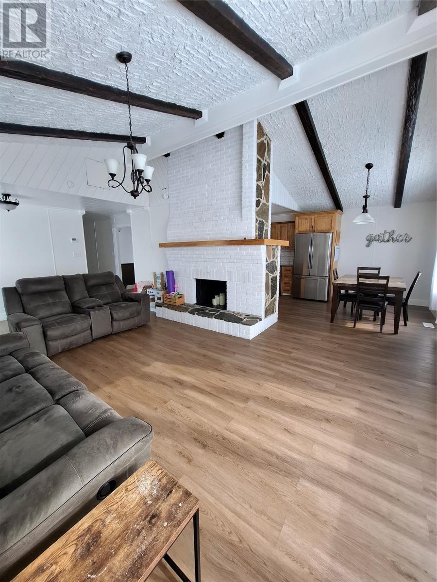 80A Loop Road, Anchor Point, NL - Indoor With Fireplace