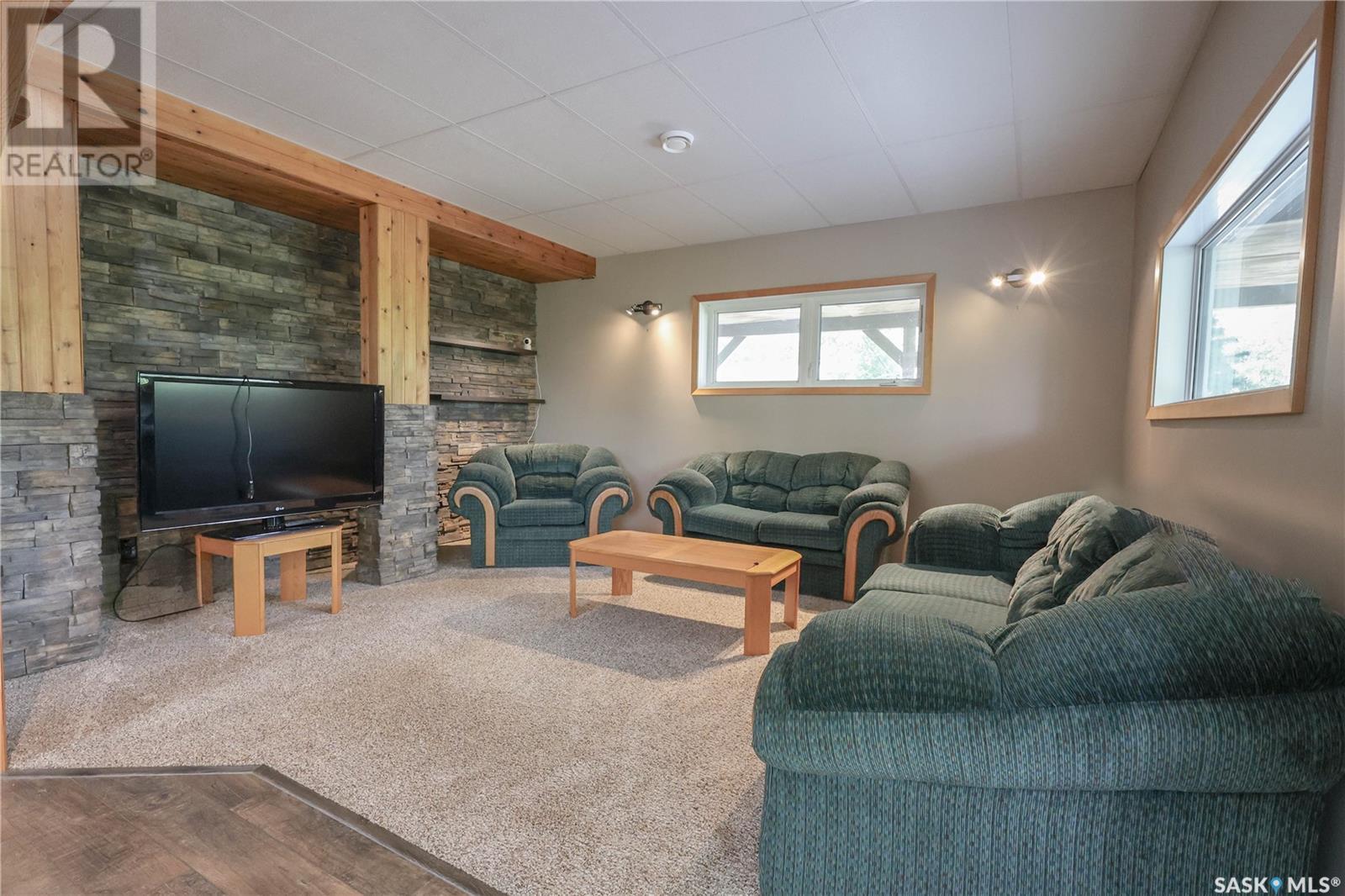 33 Carwin Park Drive, Lakeland Rm No. 521, SK - Indoor Photo Showing Living Room With Fireplace
