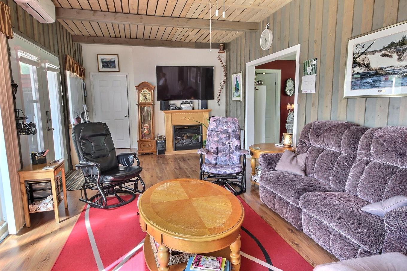 Salon - 7796 Boul. Rideau, Rouyn-Noranda, QC - Indoor Photo Showing Living Room With Fireplace
