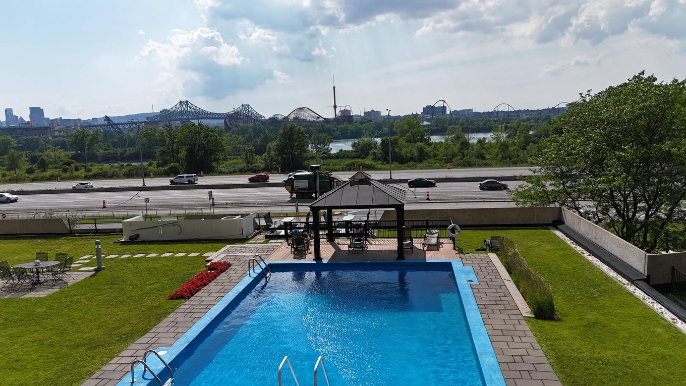 Pool - T301-51 Place Charles-Le Moyne, Longueuil (Le Vieux-Longueuil), QC - Outdoor With In Ground Pool