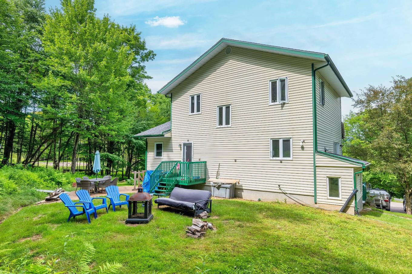 Back facade - 412 Ch. Du Lac-Mercier, Mont-Tremblant, QC - Outdoor With Exterior