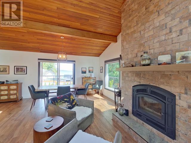 2545 Smelter Ave, Texada Island, BC - Indoor Photo Showing Living Room With Fireplace